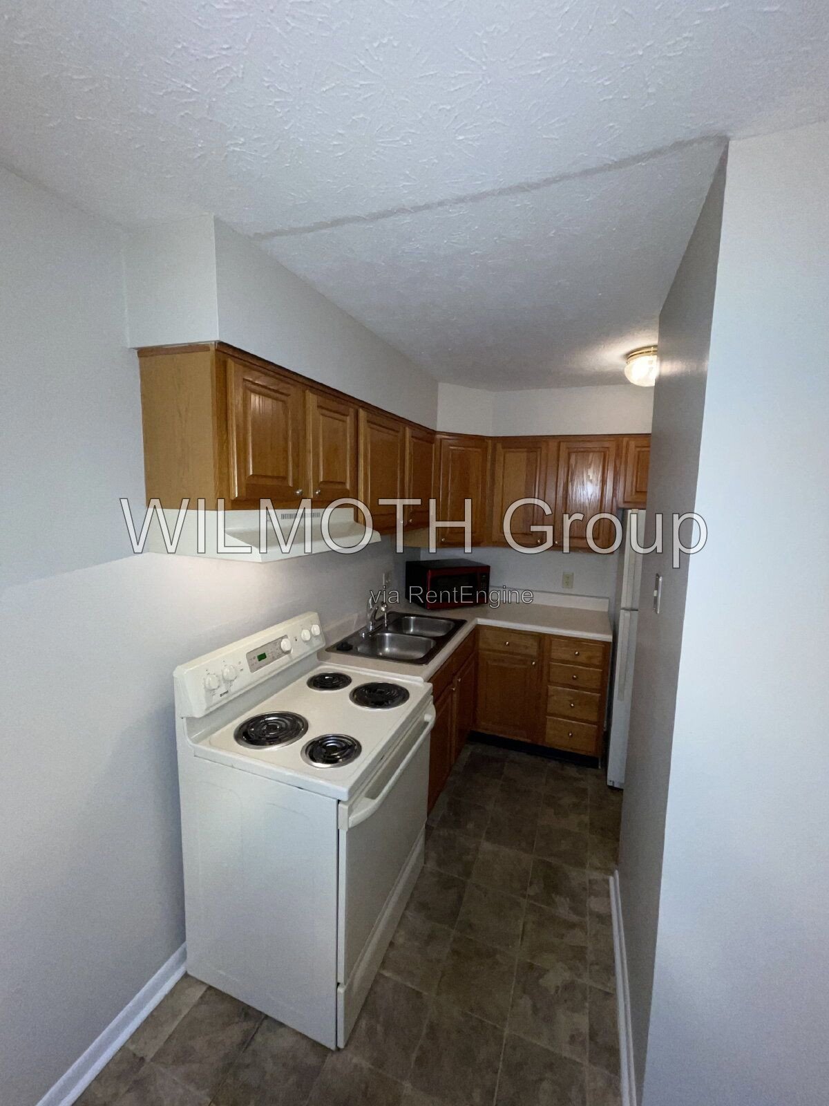 2-Bed Condo with Gleaming Hardwood Floors – 943 West McKay Road, Shelbyville! property image