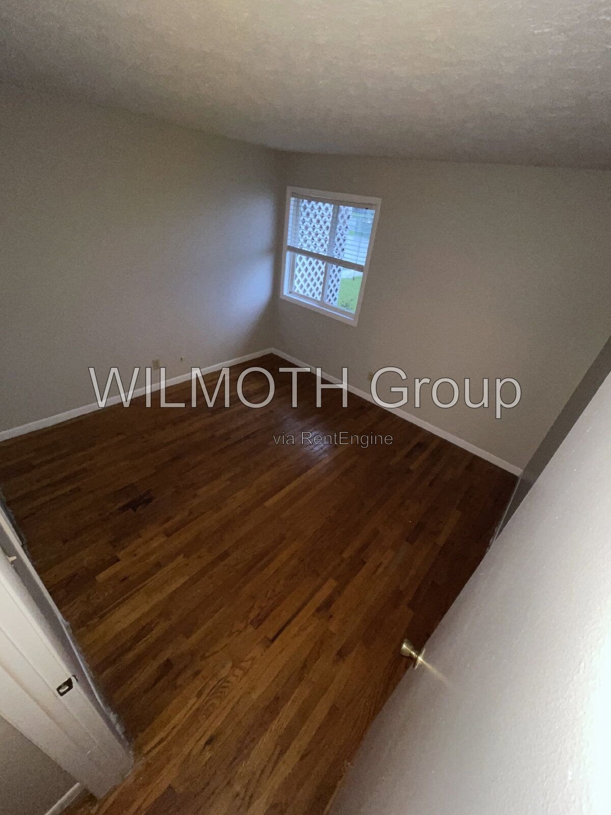 2-Bed Condo with Gleaming Hardwood Floors – 943 West McKay Road, Shelbyville! property image